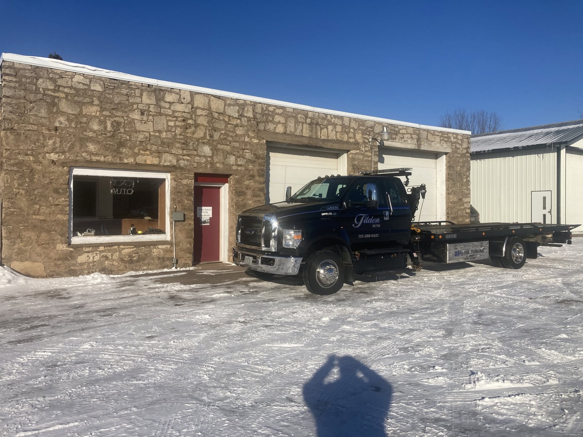 Tilden Auto & Towing truck in winter